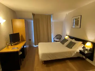 Un ou plusieurs lits dans un hébergement de l'établissement Le Relais de Castelnau
