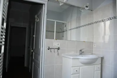Salle de bains dans l'établissement Maison bourgeoise Haussmannienne - Gîtes de France
