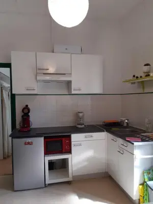 Cuisine ou kitchenette dans l'établissement La Villa des Thermes