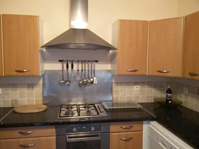 Cuisine ou kitchenette dans l'établissement Le Petit Lac