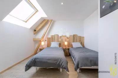 Un ou plusieurs lits dans un hébergement de l'établissement Hauméa Spa