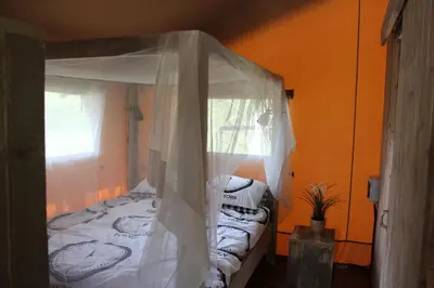 Un ou plusieurs lits dans un hébergement de l'établissement Glamping Lac du Causse