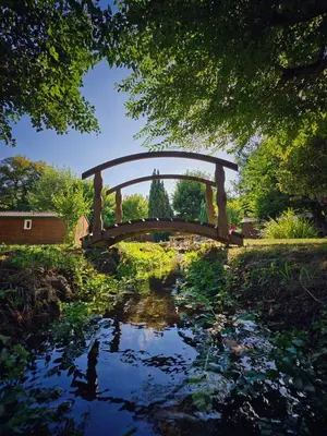 Jardin de l'établissement hôtel gites le clos du moulin