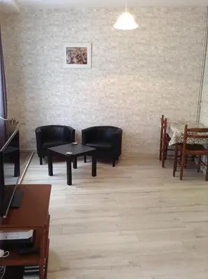 Coin salon dans l'établissement French Holiday Accommodation