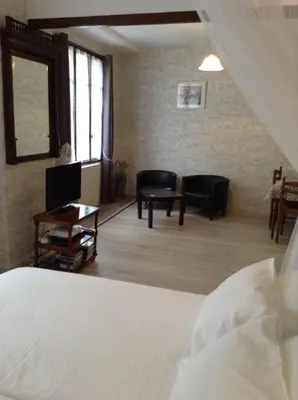 Un ou plusieurs lits dans un hébergement de l'établissement French Holiday Accommodation