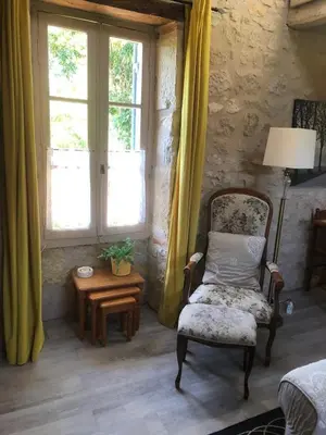 Coin salon dans l'établissement The Cottage