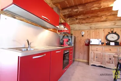 Cuisine ou kitchenette dans l'établissement Chalets de Fougerousse