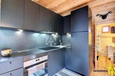 Cuisine ou kitchenette dans l'établissement Chalet de Cécile 1
