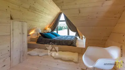Un ou plusieurs lits dans un hébergement de l'établissement Chalet des Marmottes