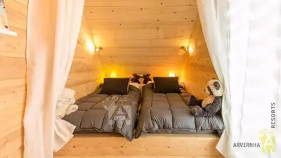 Un ou plusieurs lits dans un hébergement de l'établissement Chalet des Marmottes