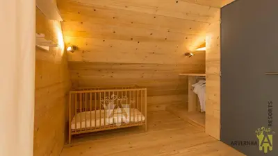 Un ou plusieurs lits dans un hébergement de l'établissement Chalet des Marmottes