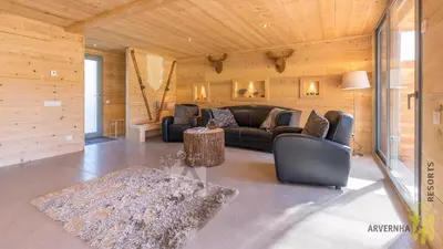 Coin salon dans l'établissement Chalet des Marmottes
