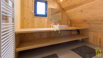 Salle de bains dans l'établissement Le Sancy