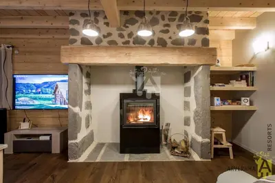Télévision ou salle de divertissement dans l'établissement Gîte du Père François