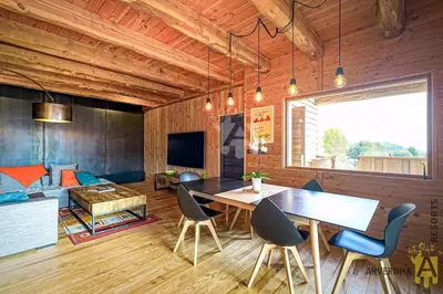 Télévision ou salle de divertissement dans l'établissement Grande Cabane du Lac