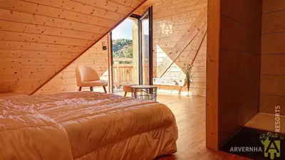 Un ou plusieurs lits dans un hébergement de l'établissement Chalet Nid Nous
