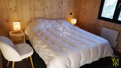Un ou plusieurs lits dans un hébergement de l'établissement Chalet Nid Nous