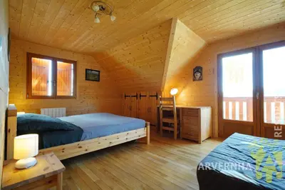 Un ou plusieurs lits dans un hébergement de l'établissement Chalet de Solène