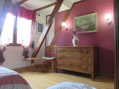 Un ou plusieurs lits dans un hébergement de l'établissement Chalet les Eglantines