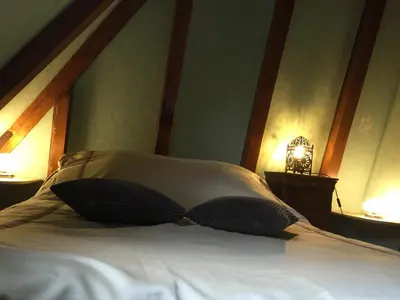 Un ou plusieurs lits dans un hébergement de l'établissement Chalet les Eglantines