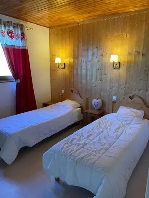 Un ou plusieurs lits dans un hébergement de l'établissement Location de la cascade 8 personnes