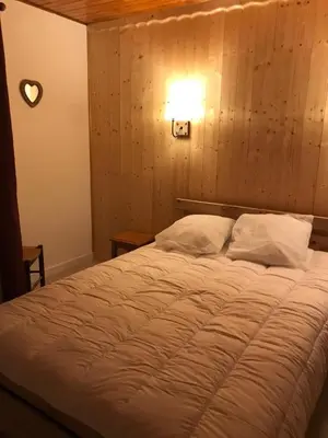 Un ou plusieurs lits dans un hébergement de l'établissement Location de la cascade 8 personnes