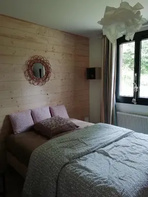 Un ou plusieurs lits dans un hébergement de l'établissement Chalet Dionysos