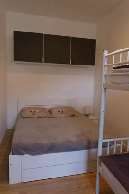 Un ou plusieurs lits dans un hébergement de l'établissement Villa Jean Julien - Le Sancy - Wifi - 2 chambres - 2 Salles d'eau - Rdc - 8 personnes - Terrasse