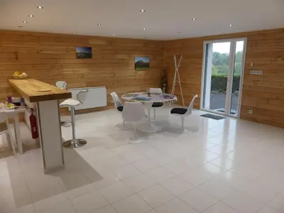 Coin salon dans l'établissement Le Gîte des Rioux,**** au cœur des Volcans d'Auvergne