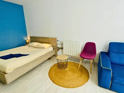 Un ou plusieurs lits dans un hébergement de l'établissement Studio aux Sources de la Chabanne