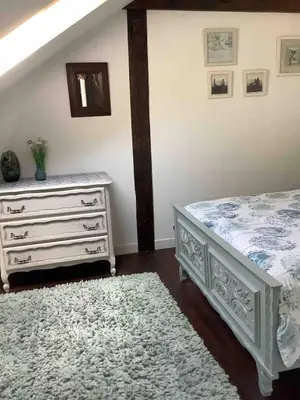 Un ou plusieurs lits dans un hébergement de l'établissement Woodland Cottage