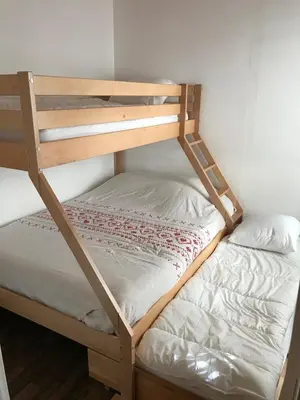 Un ou plusieurs lits dans un hébergement de l'établissement Appartement T3 Le Mont Dore Centre
