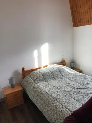 Un ou plusieurs lits dans un hébergement de l'établissement Appartement T3 Le Mont Dore Centre
