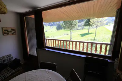 Un ou plusieurs lits dans un hébergement de l'établissement Studio Village des Longes