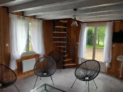Télévision ou salle de divertissement dans l'établissement Gîte de pleine nature en dordogne