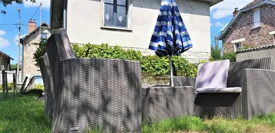 Jardin de l'établissement Wifi Clim Garage Jardin BBQ Cosy House