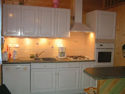 Cuisine ou kitchenette dans l'établissement chalet cathy