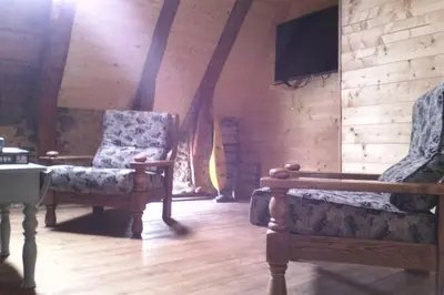 Coin salon dans l'établissement Maison de montagne