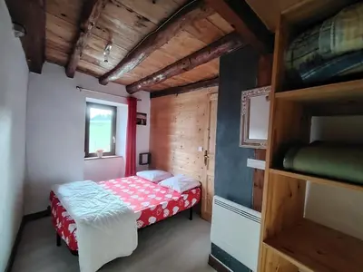 Un ou plusieurs lits dans un hébergement de l'établissement Maison de montagne