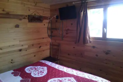 Un ou plusieurs lits dans un hébergement de l'établissement Petit chalet de montagne