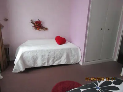 Un ou plusieurs lits dans un hébergement de l'établissement chambre chez l'habitant