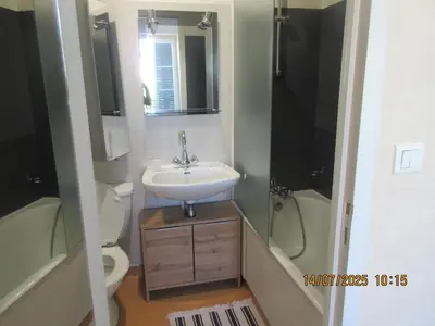 Salle de bains dans l'établissement chambre chez l'habitant