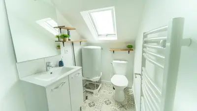 Salle de bains dans l'établissement Cosy Apparts Brive