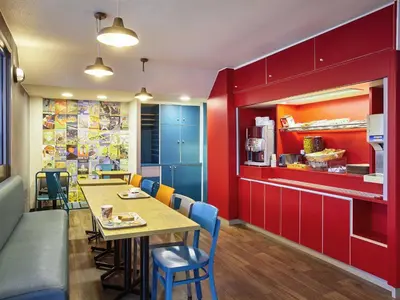 Restaurant ou autre lieu de restauration dans l'établissement hotelF1 Limoges
