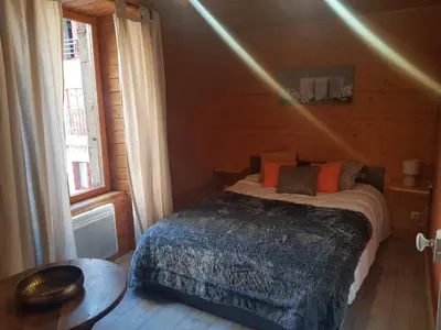 Un ou plusieurs lits dans un hébergement de l'établissement Le cocon du sancy