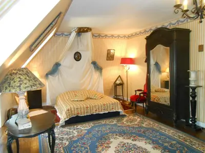 Un ou plusieurs lits dans un hébergement de l'établissement Chateau De Courbelimagne, Raulhac