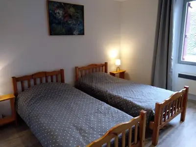 Un ou plusieurs lits dans un hébergement de l'établissement Maison Village Hautefage