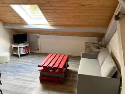Télévision ou salle de divertissement dans l'établissement Appartement F3