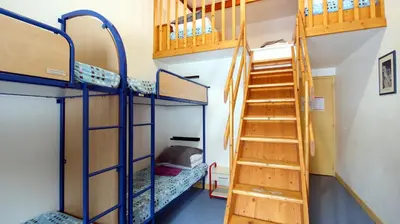 Un ou plusieurs lits superposés dans un hébergement de l'établissement Auberge de Jeunesse HI Le Mont-Dore