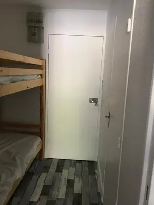 Un ou plusieurs lits dans un hébergement de l'établissement Appartement au pied des pistes
